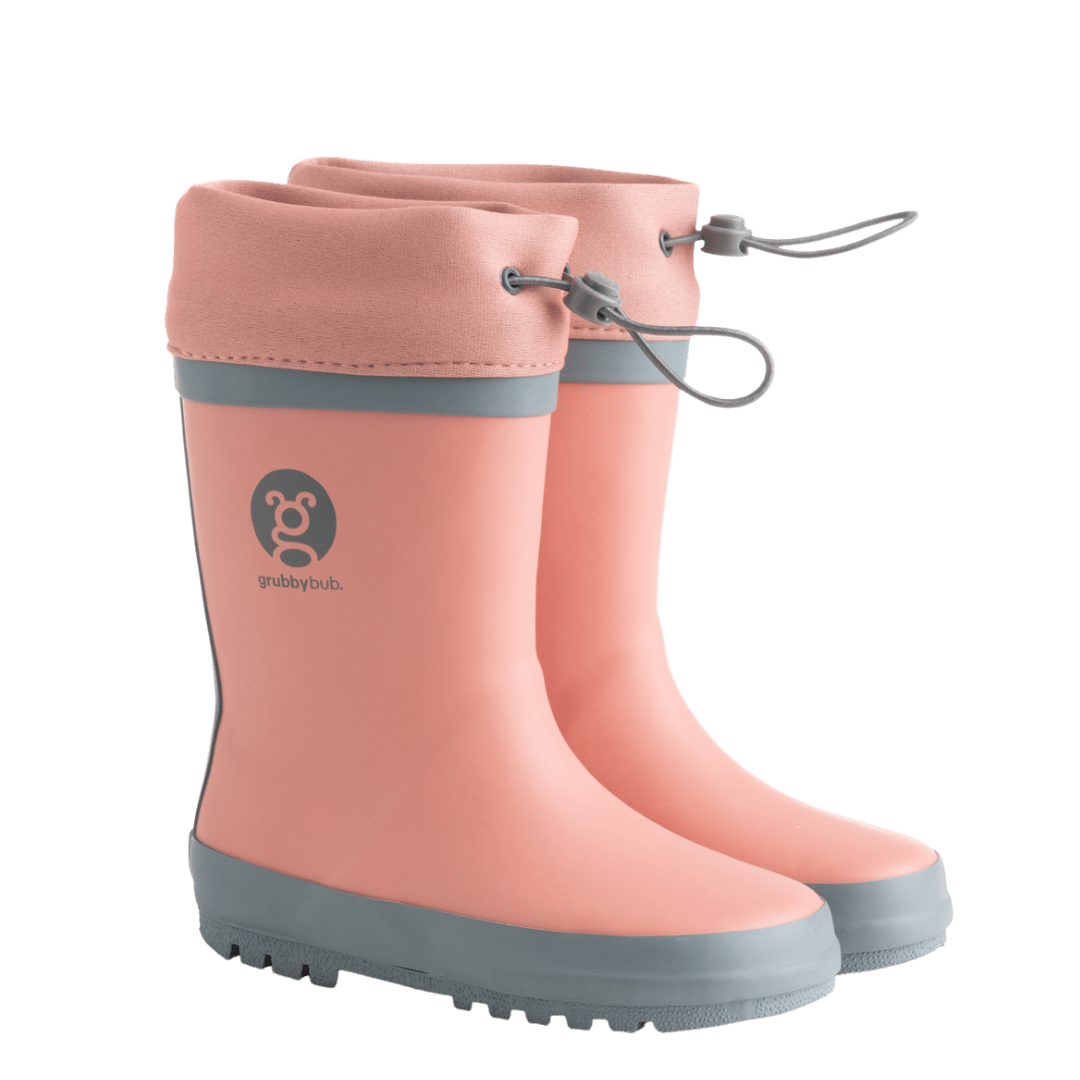 Grubbybub kids gumboots are a good splash above your regular gumboot. Front view with logo and pull string toggles in our Pink Just Peachy colour