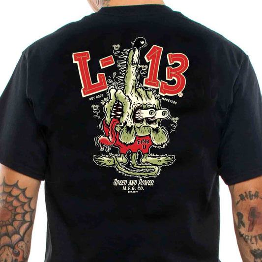 Tattooed man wearing a lucky 13 black t-shirt with &quot;The Fink&quot; lowbrow art motif
