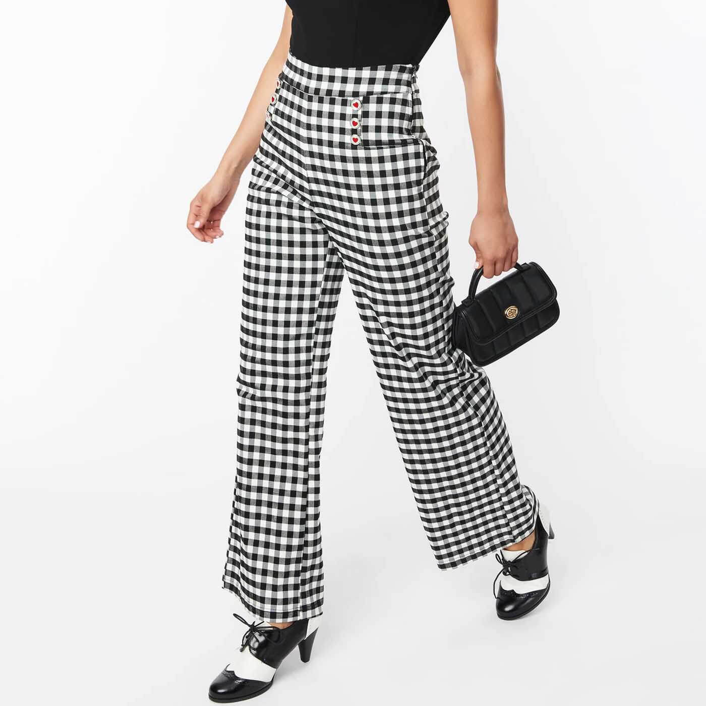 Model wearing Hiht waisted black and white gingham 1950s style  trousers  