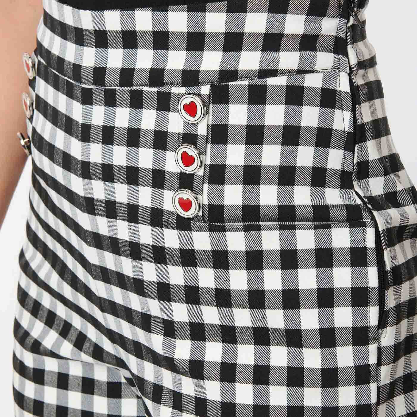 Close up of the button and pocket details of the ginger gingham trousers from Unique Vintage